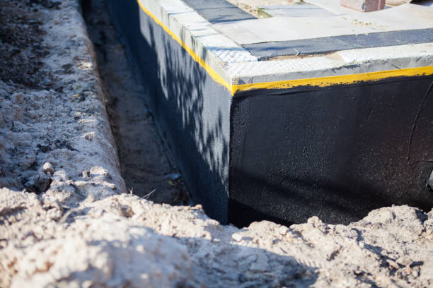 Professional Interior Drainage System technician working in Fairfax Station, VA